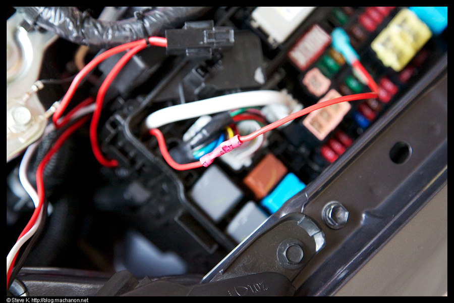 Shorten the 12v red wire from the 15A inline fuse holder as necessary and reconnect with end-butt connector
