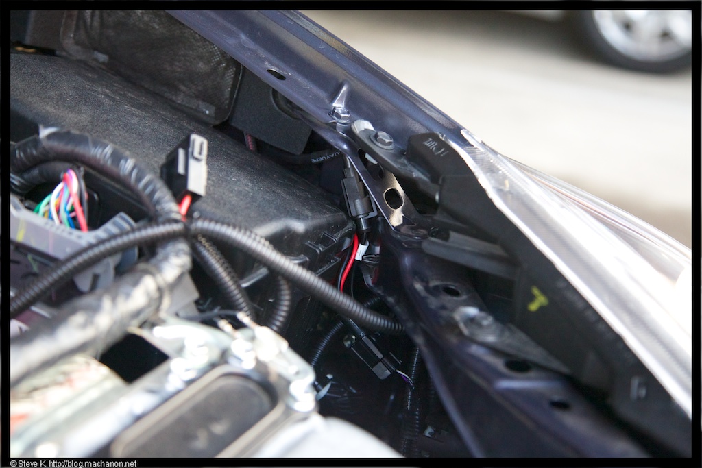 Connect the extension cable to the OEM headlight connector