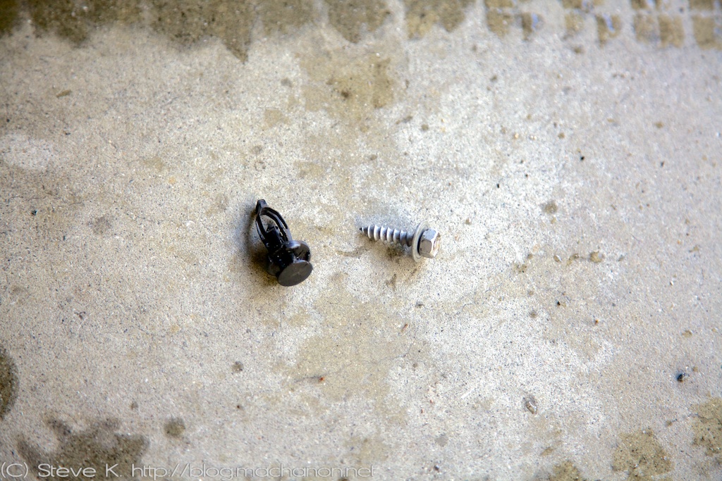 Black push-pin clip and silver plastic 10 mm bolt