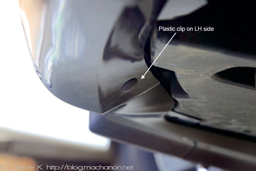 Close-out clip installed onto left hand side of center rear air dam