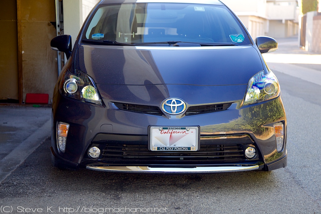 Front view of 2012 Toyota Prius ZVW30 with custom blacked-out headlights